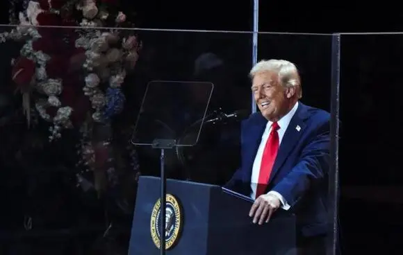 Donald Trump speaking on stage, image from Newsbreak